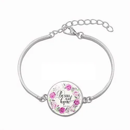 Браслет Be still and know. На белом фоне. Цвет серебро.